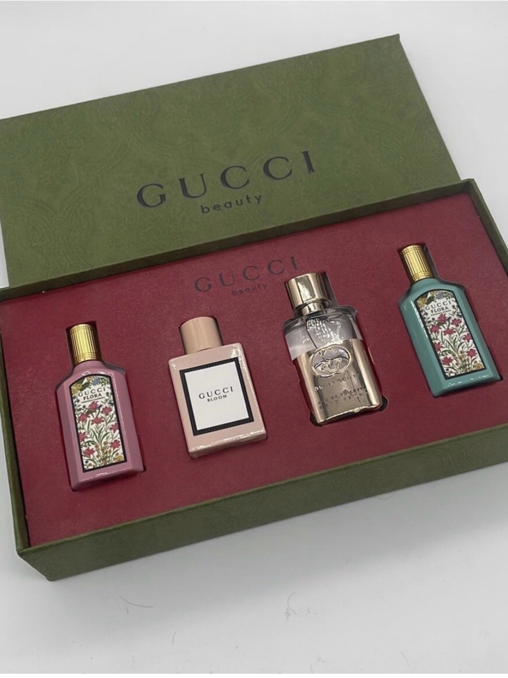 Gucci Mini Fragrance Gift Set — Green Box with Pink, Blush, Gold & Teal Bottles